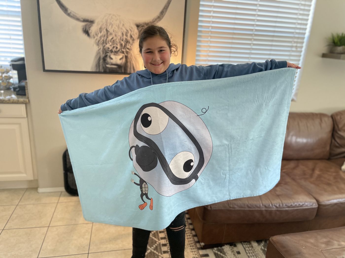 A fan holding up the Big Head Bob towel