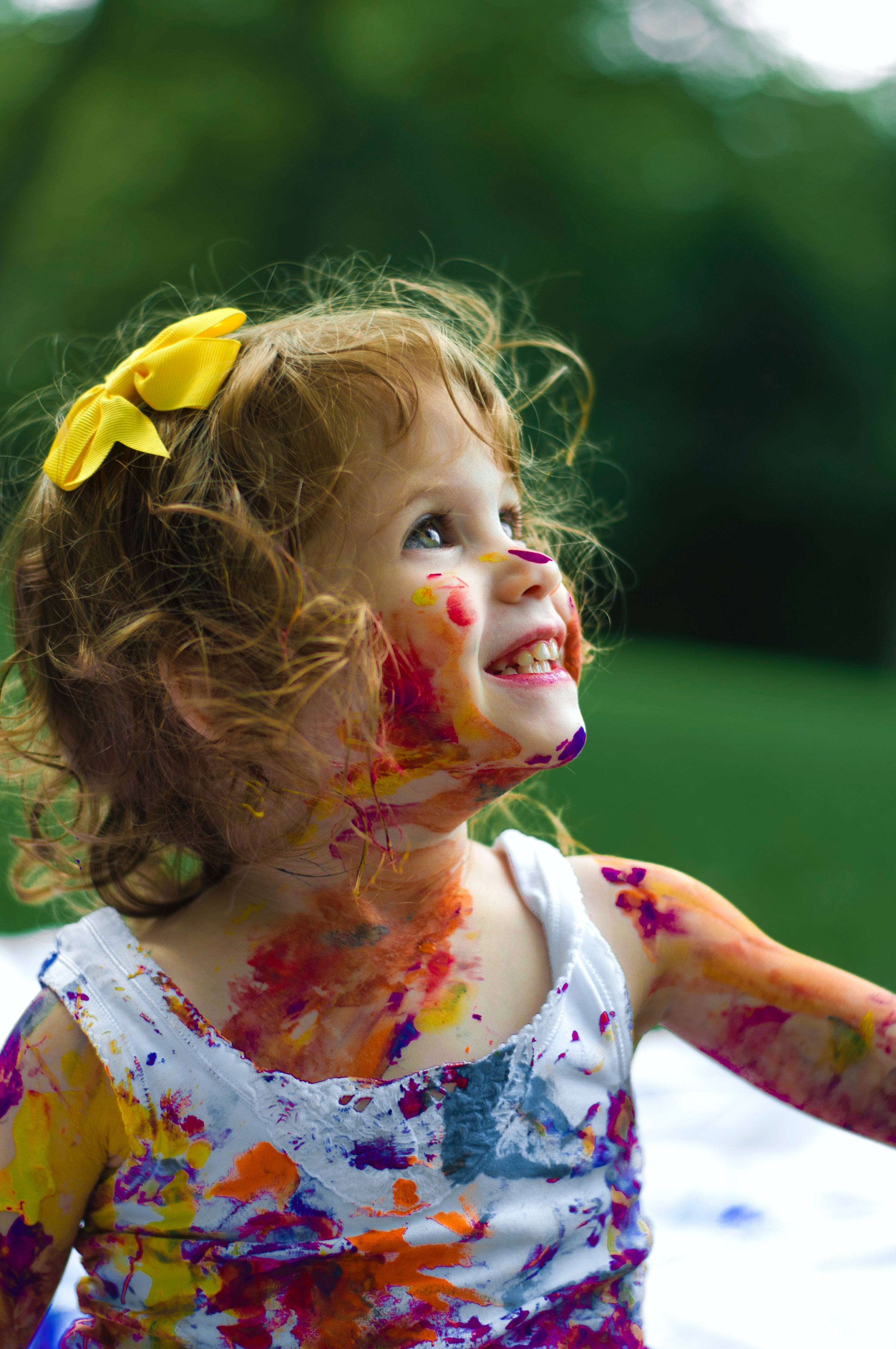 Little girl covered in paint picture by Senjuti Kundu
